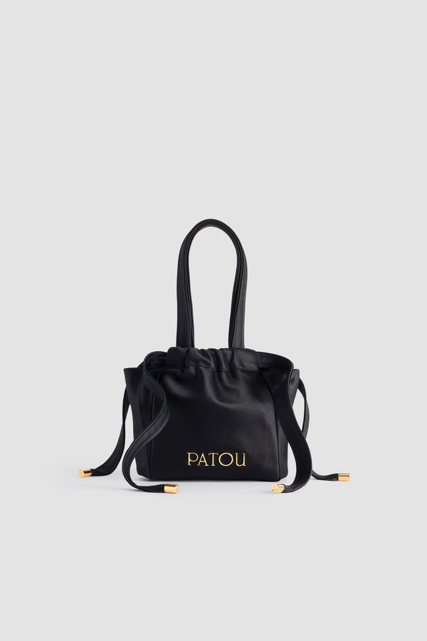 Patou - Evening pouch in recycled satin - Black - Black recycled satin pouch. Drawstring lace fastening. Top handles. Gold-tone metal Patou. Fully lined.