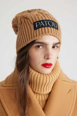 Cable knit beanie in sustainable wool