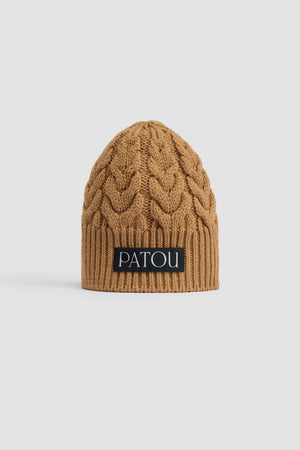 Cable knit beanie in sustainable wool