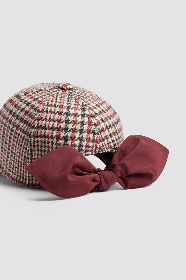 Patou - Couture cap in wool flannel - Prince Of Wales - Wool flannel cap. Prince of Wales pattern. Embroidered JP monogram at the front. Polyester faille bow fastening at the back.