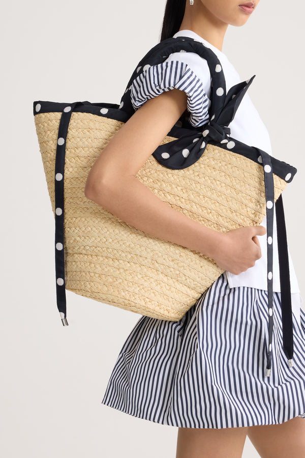 Patou - Large Raffia Bucket Bag - Meteorite Blue - Large natural bucket bag. Raffia material. Black polka dot handles and ties.