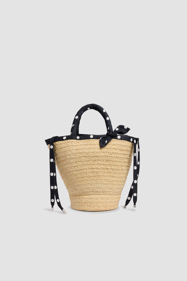 Patou - Large Raffia Bucket Bag - Meteorite Blue - Large natural bucket bag. Raffia material. Black polka dot handles and ties.
