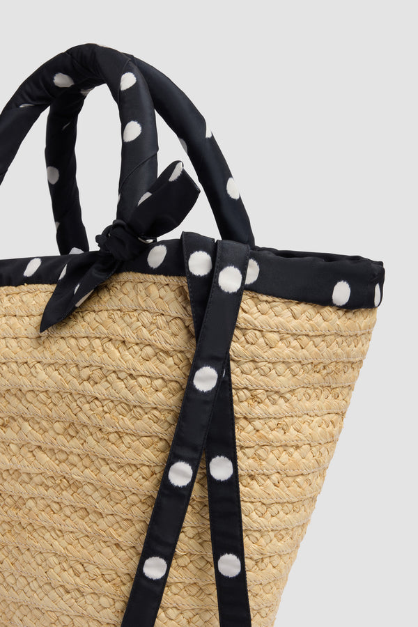 Patou - Large Raffia Bucket Bag - Meteorite Blue - Large natural bucket bag. Raffia material. Black polka dot handles and ties.