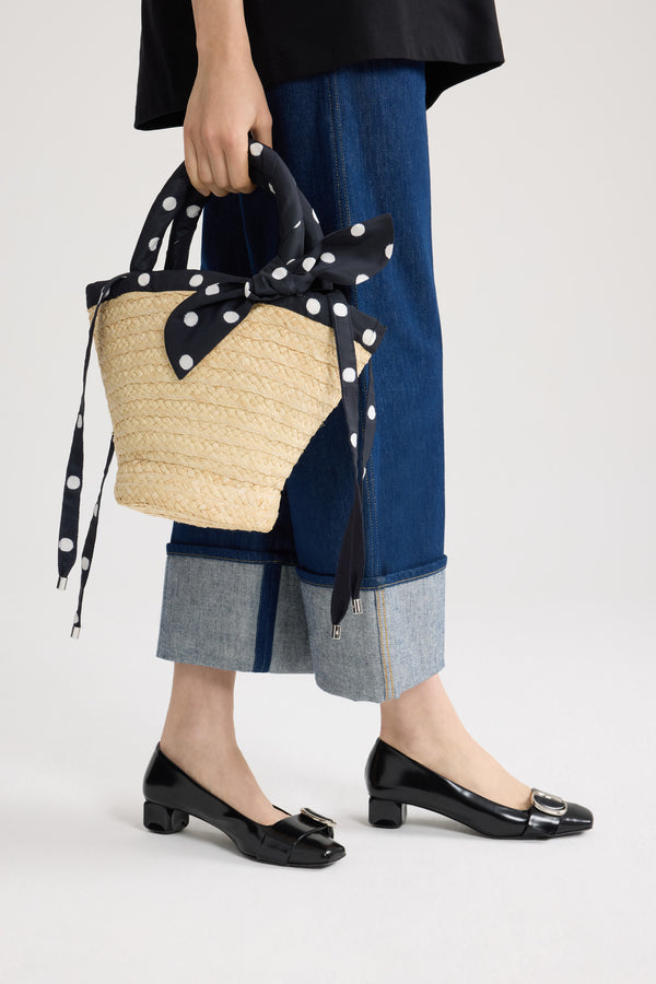 Patou - Small Raffia Bucket Bag - Meteorite Blue - Small natural bucket bag. Raffia material. Black polka dot handles and ties.