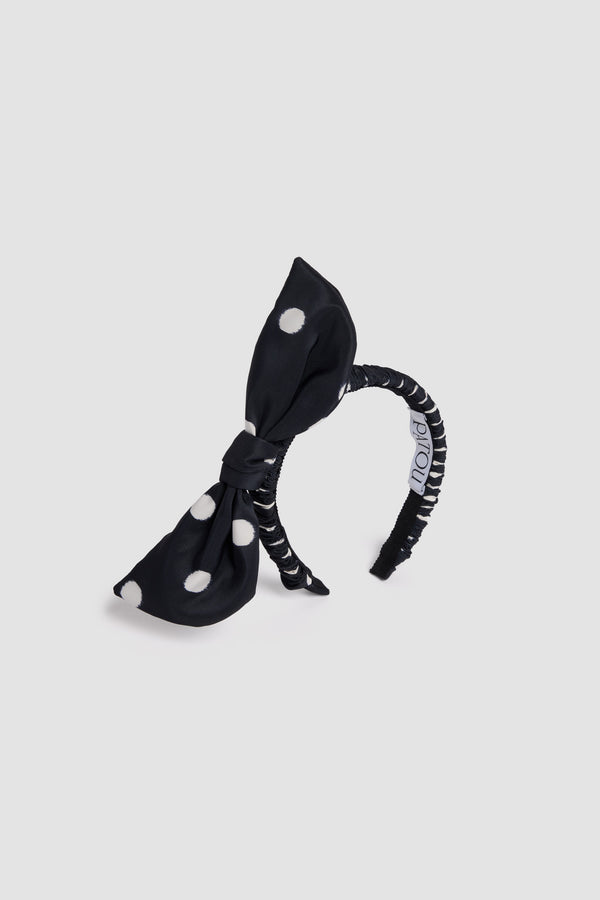 Patou - Recycled Faille Knotted Headband - Meteorite Blue - Navy blue recycled faille headband with white polka dots and structured knot on top.