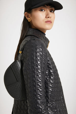Le Petit Patou logo bag in leather
