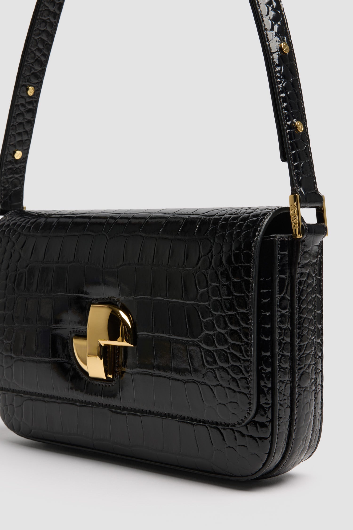 Patou - Le Classic Lock bag in crocodile-embossed leather - Black - Black crocodile-embossed leather handbag. Classic day bag inspiration with a twist. Gold Art Deco JP twist clasp at the front. Adjustable strap that allows it to be worn short or long. Leather lining.