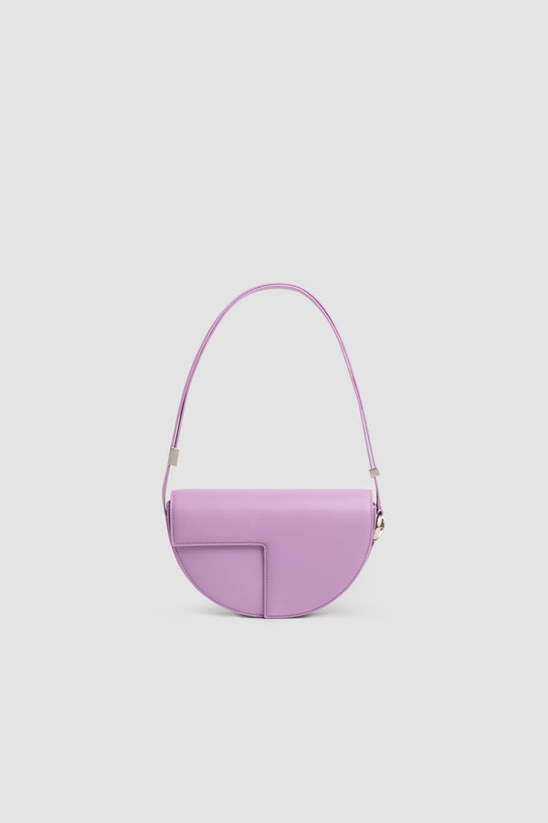 Patou - Le Patou Leather Bag - Lavender - Le Patou bag in violet leather. Half-moon shape. Adjustable and removable shoulder strap. Flap closure with golden JP monogram.