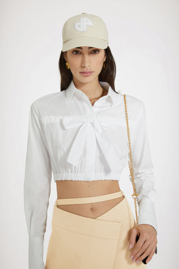 Patou - Bow cropped blouse in sustainable cotton
