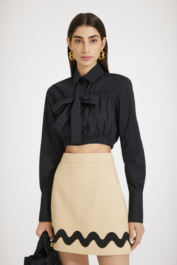 Patou - Bow cropped blouse in sustainable cotton