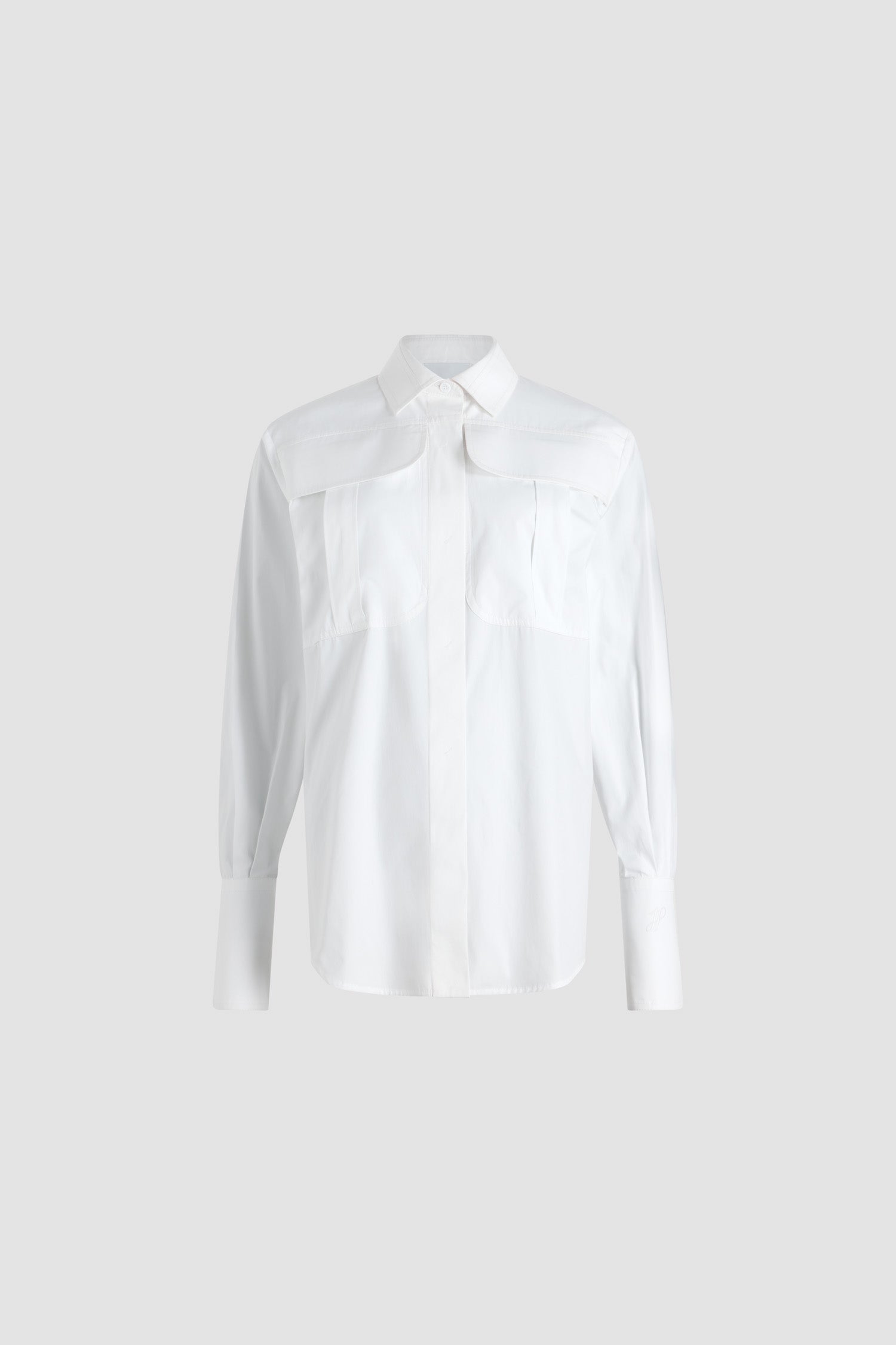 Patou - Safari shirt in organic cotton poplin - White - White organic cotton poplin shirt. Straight silhouette. Shirt collar. Concealed button front fastening. High chest flap pockets. Buttoned cuffs with an embroidered JP calligraphy monogram on the left sleeve.
