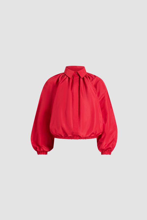Patou - Blusa a palloncino in faille riciclato - Lipstick Red - Blusa in faille di poliestere riciclato Lipstick Red. Silhouette voluminosa. Taglio leggermente corto. Classico collo a camicia. Chiusura sul davanti con bottone nascosto. Maniche a palloncino con polsini elasticizzati. Fondo dall’effetto bombato.