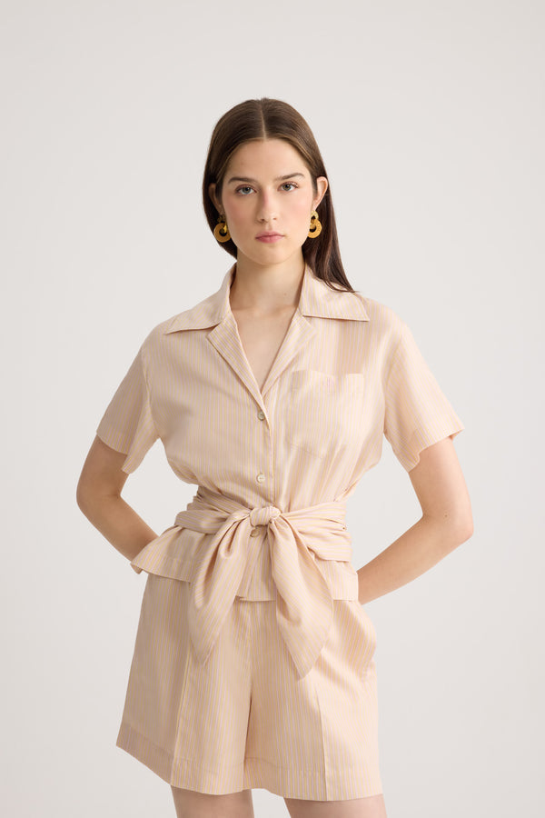 Patou - Knotted Blended Silk Beach Shirt - Shell Beach Stripes - Apricot beige shirt, with yellow and pink stripes. Short sleeves. Knotted waist.This piece is from the " Patou Plage" Capsule, designed by Guillaume Henry.