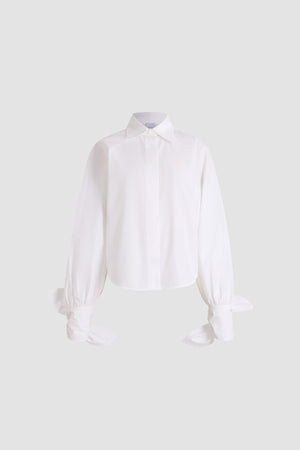 Blusa con maniche annodate in cotone biologico