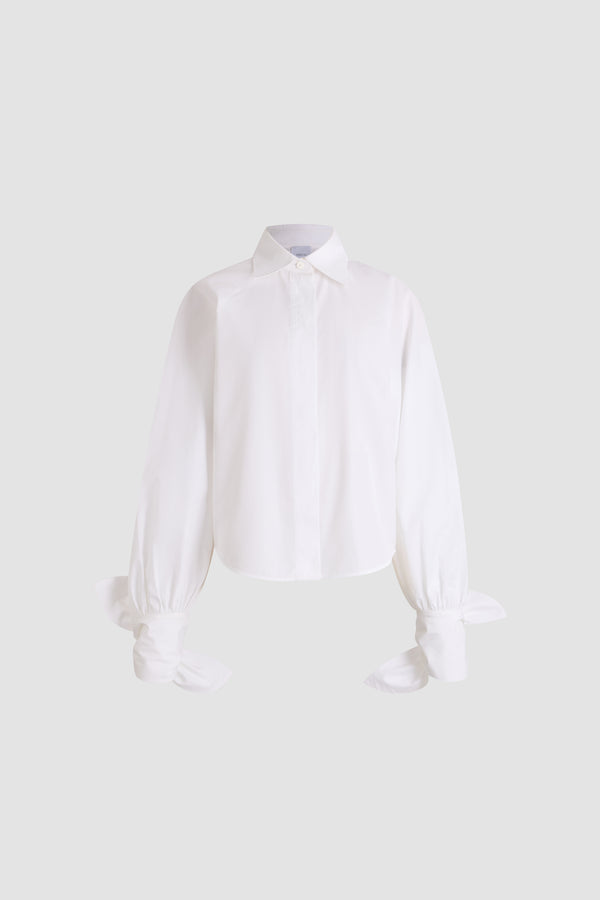 Patou - Bluse mit gebundenen Ärmeln aus Bio-Baumwolle - White - Weiße Bluse aus Bio-Baumwolle. Lange Ärmel. Gebundene Manschetten. Hemdkragen. Knopfleiste vorne. Lässige Passform.