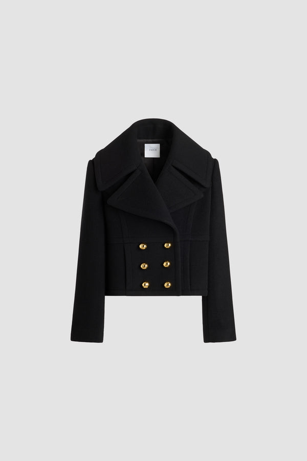 Patou - Cropped double-breasted coat in sustainable wool blend - No Label Black - Black sustainable wool blend coat. Cropped length. Straight silhouette. Double-breasted construction. Wide peak lapel. Gold-tone half-sphere JP monogram buttons. Curved seams at the front. Seam pockets. Lined.