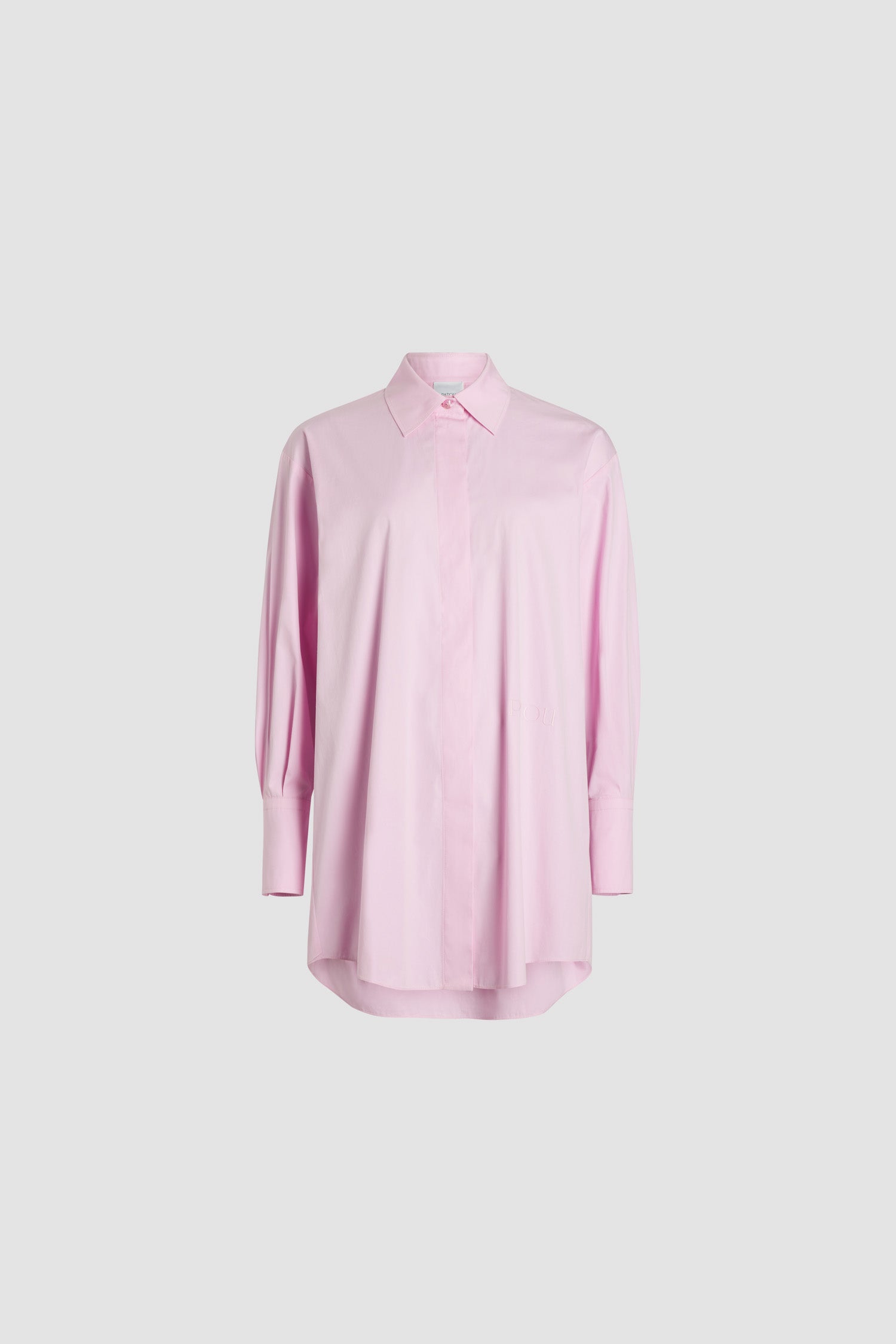 Patou - Iconic mini shirt dress in organic cotton - Rosebloom Pink - Rosebloom Pink organic cotton poplin dress. Short length. Loose silhouette. Shirt collar. Concealed button fastening with JP-engraved buttons. Embroidered Patou at the front. Buttoned cuffs.This style is oversized.