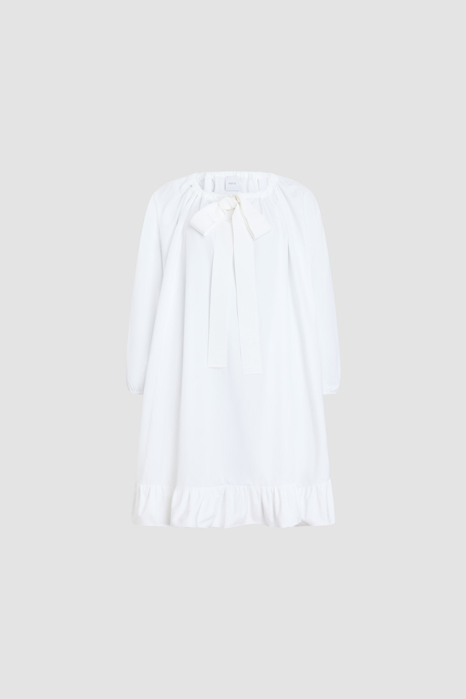 Patou - Grosgrain ruffle hem dress in organic cotton - White - Grosgrain and ruffles paint the perfect Patou picture.White organic cotton dress. Elasticated neckline with grosgrain drawstring that can be worn off the shoulders. Balloon sleeves with elasticated cuffs. Double ruffle at the hem.Loose fit (select one size down for a fitted look).