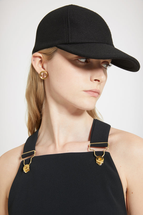 Patou - Vestito salopette in crepe tecnico - Black - La salopette disegna una nuove silhouette.Vestito in crepe tecnico nero. Lunghezza midi. Vestibilità aderente con spacco alto sul davanti. Ispirazione salopette con spalline aggiustabili e fibbie in metallo oro. Schiena regolabile con cut-out. Cintura alta.Modello aderente.