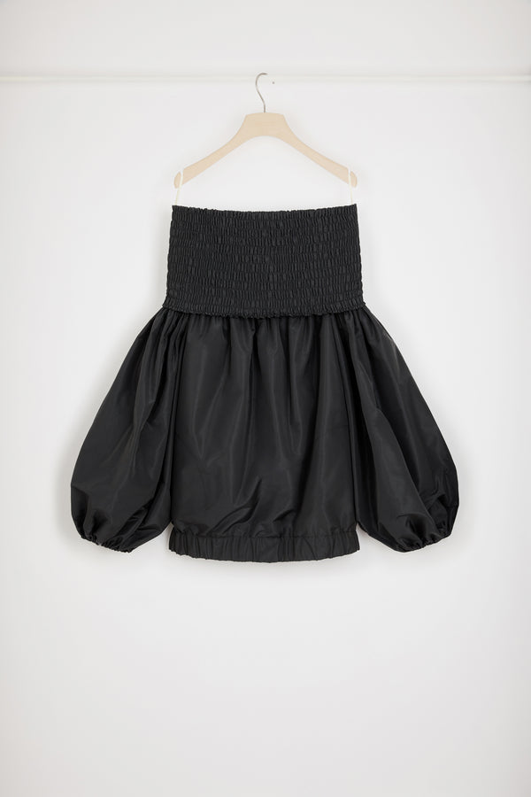 Patou - 친환경 파유 소재의 오프숄더 스목 미니 드레스 - Black - 오프 더 숄더, 온 더 레이더.블랙 재생 파유 소재의 드레스. 짧은 기장. 오프숄더 스목 네크라인. 신축성 있는 커프스로 마감한 볼륨 슬리브. 측면 포켓. 엘라스틱 버블 헴.이 드레스는 기장이 짧습니다.