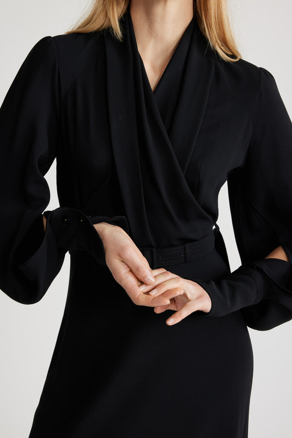 Patou - Wrap bodice maxi dress in sustainable crepe - Black - Black sustainable viscose crepe dress. Maxi length. V neckline. Draped wrap bodice. Puff shoulders. Split sleeves with buttoned cuffs that can be unfastened to create a cape silhouette. Adjustable belt at the waist. This style is fitted at the waist.