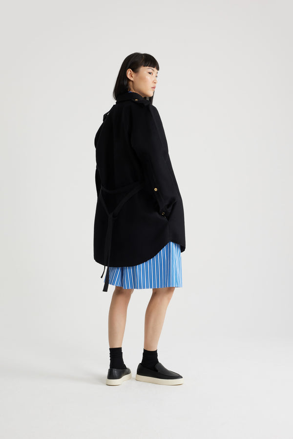 Patou - Mini shirt dress in sustainable wool blend - Black - Black sustainable wool blend flannel dress. Short length. Straight silhouette. Shirt collar. Gold-tone JP-engraved buttons. Volume raglan sleeves. Buttoned cuffs. Removable self-tie belt at the waist. Embroidered Patou and JP at the front. Lined.