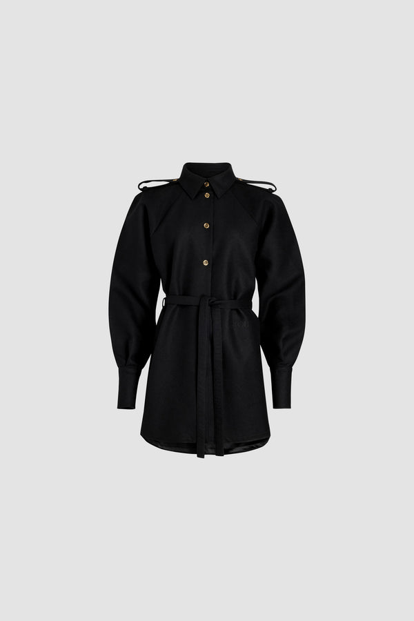 Patou - Mini shirt dress in sustainable wool blend - Black - Black sustainable wool blend flannel dress. Short length. Straight silhouette. Shirt collar. Gold-tone JP-engraved buttons. Volume raglan sleeves. Buttoned cuffs. Removable self-tie belt at the waist. Embroidered Patou and JP at the front. Lined.