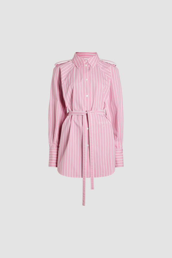 Patou - Mini shirt dress in printed sustainable cotton - Pink Stripes - Pink sustainable cotton poplin dress. Striped pattern. Short length. Straight silhouette. Shirt collar. JP-engraved mother-of-pearl buttons. Shoulder tabs. Volume raglan sleeves. Buttoned cuffs. Removable self-tie belt at the waist. Embroidered Patou and JP at the front.