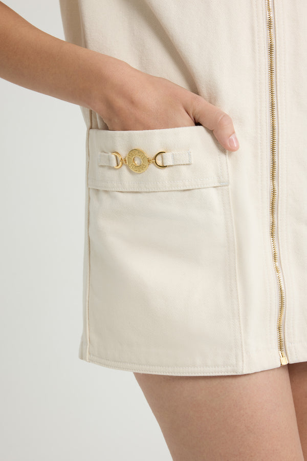 Patou - Vestito mini con zip in denim di cotone - Natural - Vestito in denim di cotone naturale écru. Lunghezza mini. Taglio dritto. Colletto largo. Zip oro sul davanti. Tasche a toppa con medaglione oro inciso con il logo Patou Piega sul retro.Questo modello è molto corto.