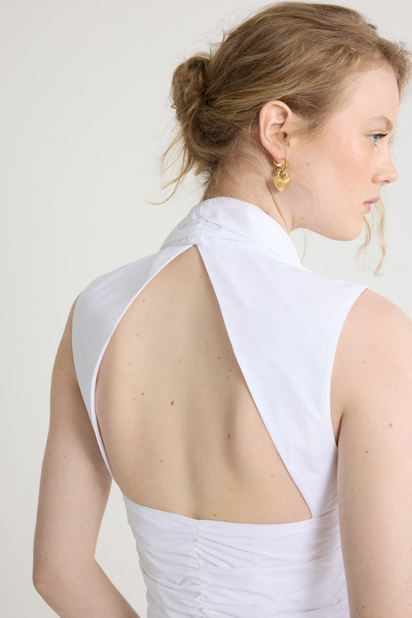 Patou - Robe boule courte dos nu en faille recyclée - White - Robe en faille recyclée blanche. Modèle court. Bustier ajusté avec fronces à la taille. Col V profond. Dos nu. Jupe boule.Cette robe fait partie de la collection Cérémonie créée pour les occasions spéciales.