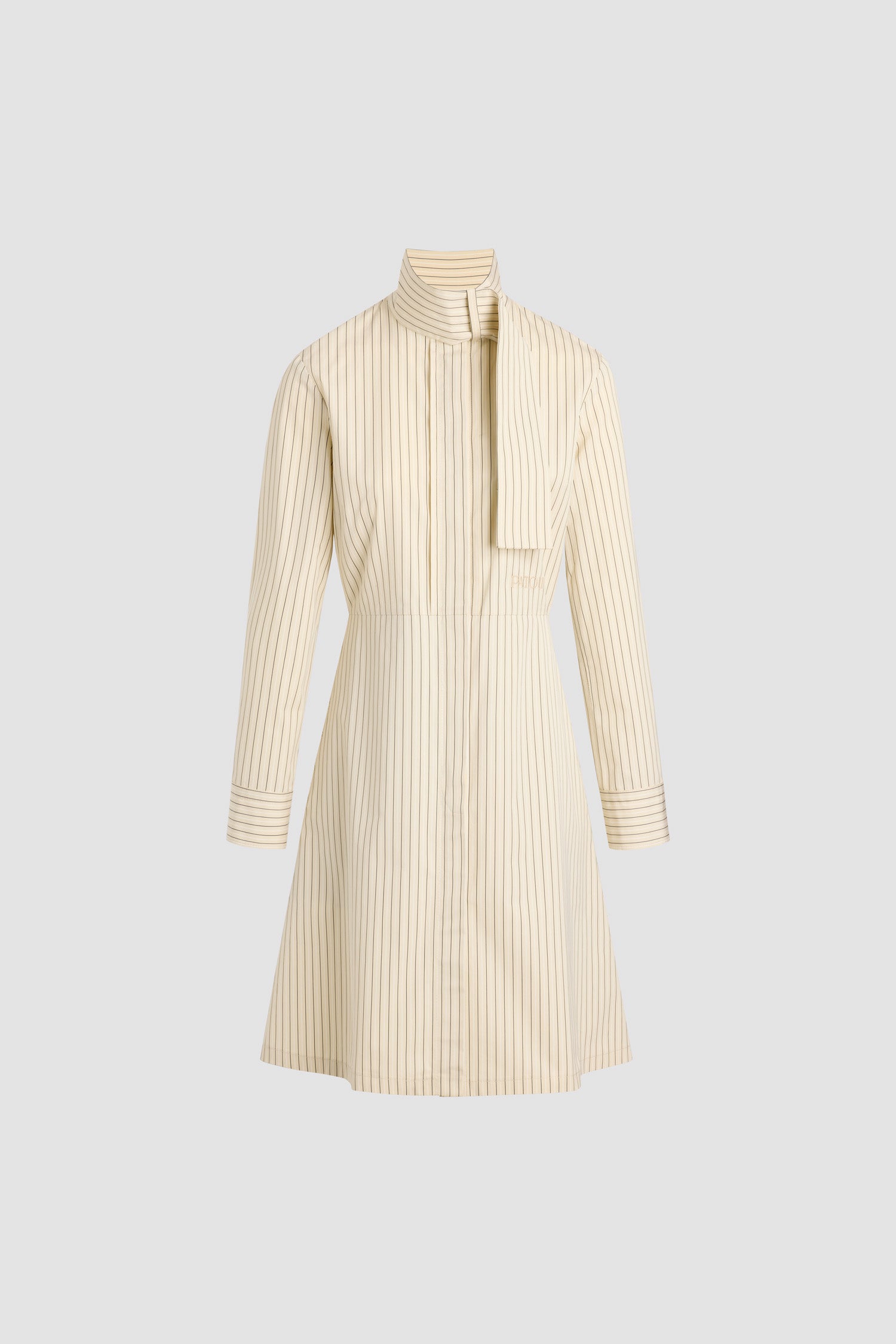 Patou - Scarf collar shirt dress in organic cotton poplin - Snowberry Stripes - Snowberry organic cotton dress. Striped pattern. Knee length. Fit and flare silhouette. Scarf collar with loop at the front. Concealed button front fastening. Patou logo embroidered at the waist. Buttoned cuffs. Pockets at the sides.