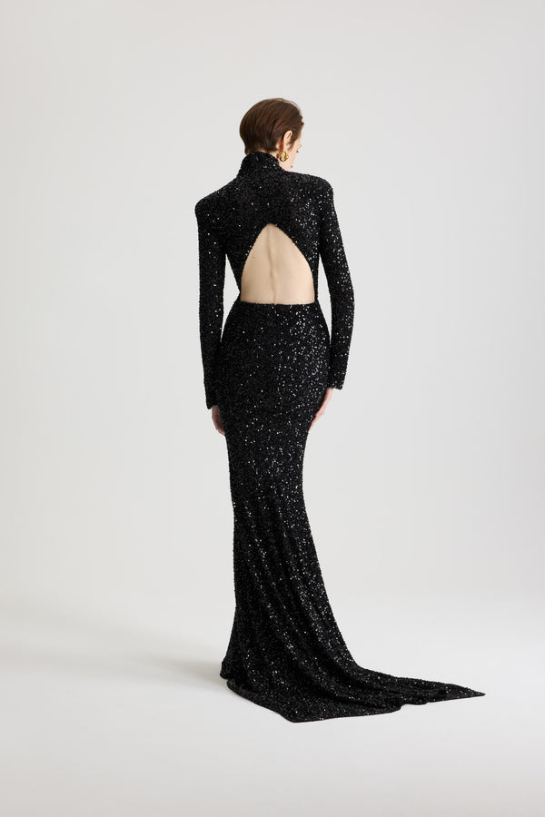 Patou - Vestito maxi con apertura geometrica sulla schiena con paillettes - Black - Vestito con paillettes nero. Lunghezza maxi. Silhouette aderente con gonna a sirena. Collo alto. Apertura geometrica sulla schiena. Chiusura con zip sul retro. Elastico.