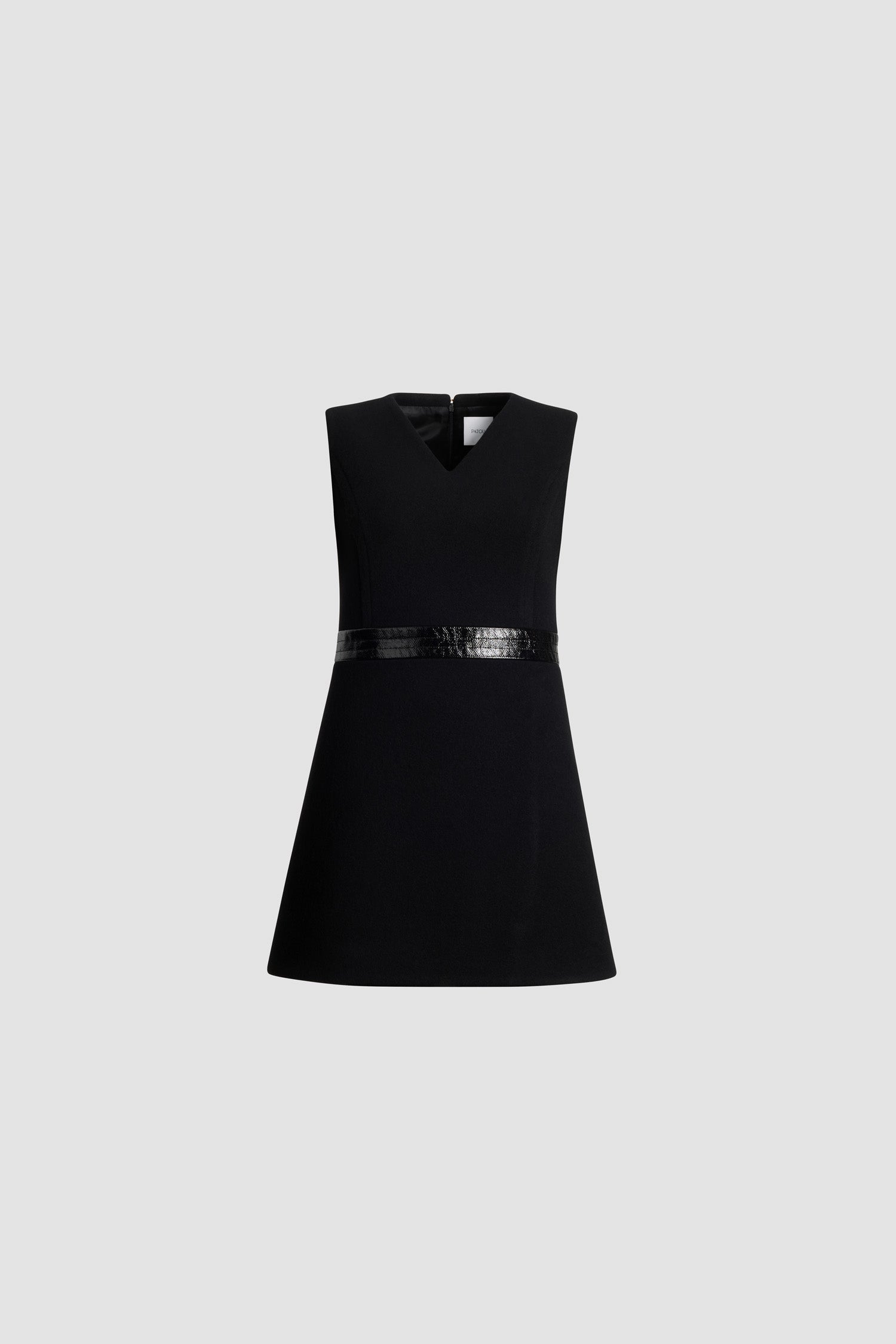 Patou - Mini shift dress in sustainable wool blend - Black - Black sustainable wool blend dress. Short length. V neckline. Zip fastening at the back. Contrast patent leather waistband. Lined.