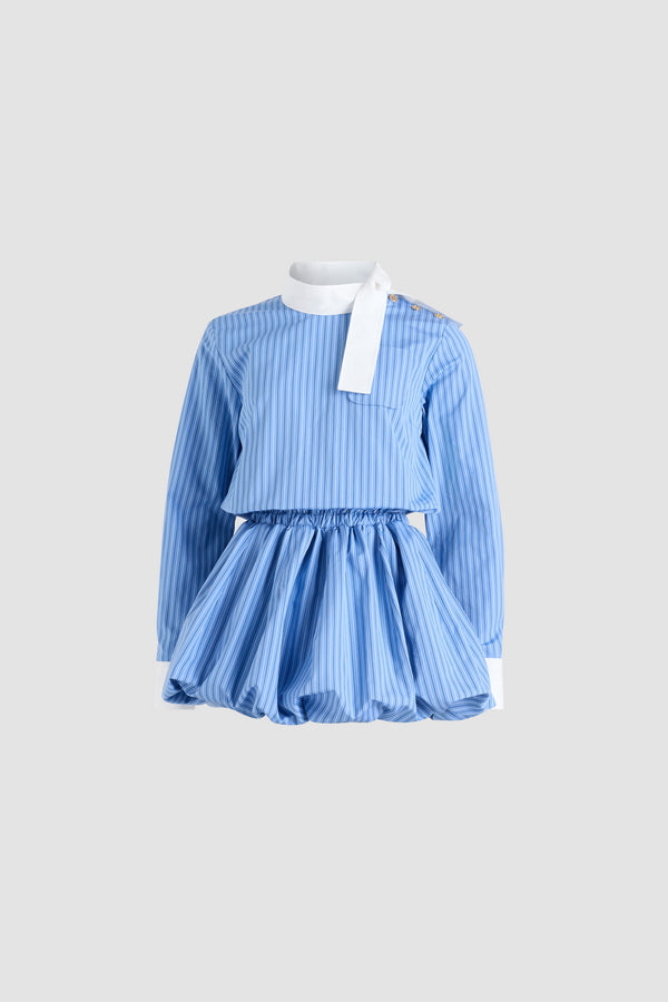 Patou - Bubble mini dress in organic cotton poplin - Ice Blue Stripes - Ice Blue organic cotton poplin dress. Striped pattern. Short length. Contrast scarf collar. Chest patch pocket. Elasticated waist. Embroidered Patou logo on the left cuff. Contrast buttoned cuffs. Pockets at the side. Bubble hem.