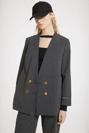 Collarless double-breasted jacket in technical wool twill
