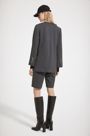 Collarless double-breasted jacket in technical wool twill