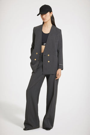 Collarless double-breasted jacket in technical wool twill