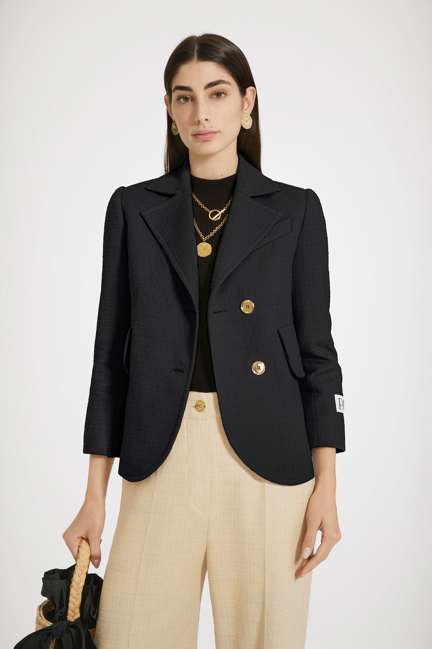 Patou - Tailored jacket in cotton tweed - Black - One perfect tailored jacket, endless possibilities.Black cotton tweed jacket. Single-breasted style with off-center placket. Fitted tailored silhouette. Wide notch lapels. Gold-tone Patou-engraved buttons. Flap pockets. Cropped sleeves. Patou label on the left sleeve. Lined.