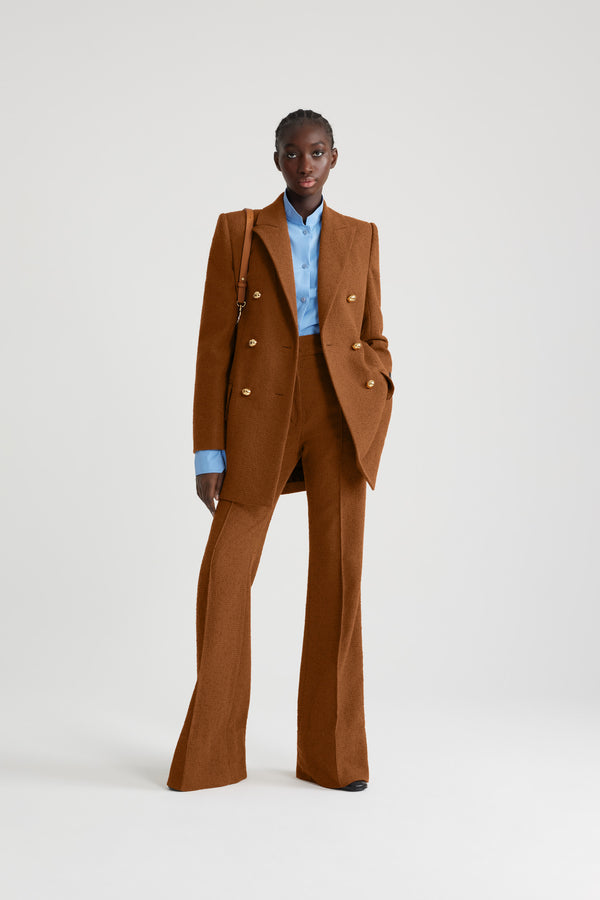 Patou - Double-breasted jacket in sustainable wool and organic cotton tweed - Autumn Leaf - Autumn Leaf brown sustainable wool and organic cotton tweed jacket. Slim longline silhouette. Double-breasted construction. Peak lapels. Gold-tone half-sphere JP buttons. Flap pockets. Buttoned cuffs. Patou label on the left sleeve. Single vent. Lined.This style is fitted at the waist and is cut for a mid-thigh length.