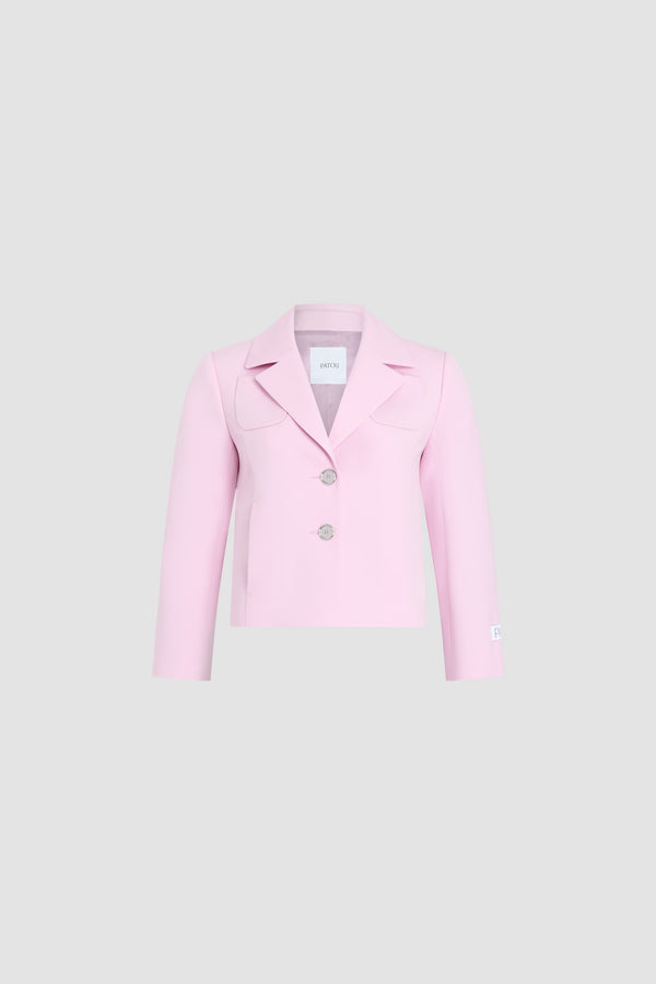 Patou - Giacca corta sartoriale in misto lana eco-responsabile – senza logo - Orchid Ice - Giacca corta sartoriale rosa pallido. Collo a camicia. Bottoni argentati. Taglio aderente.