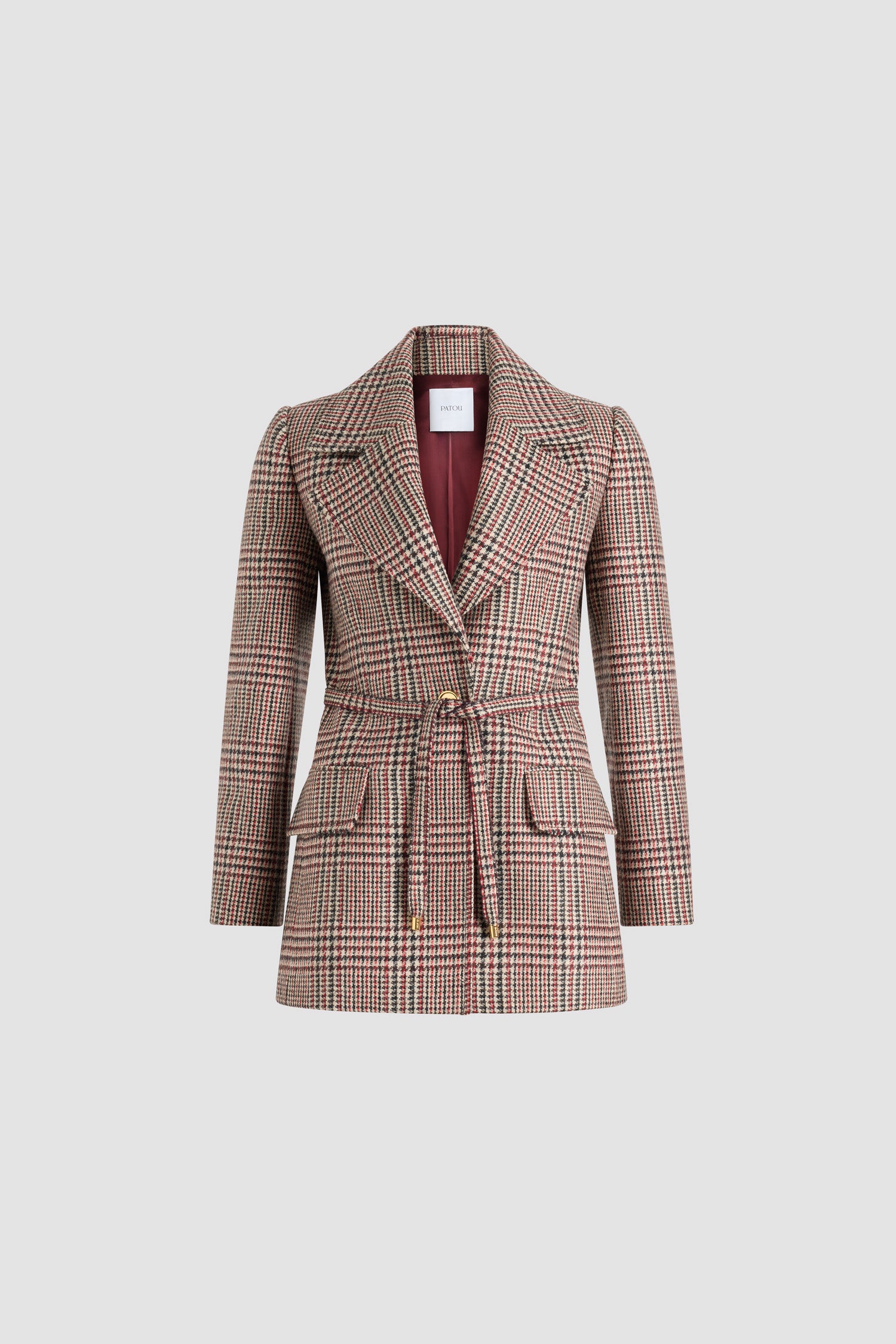 Patou - サステナブルウールフランネル ロングライン シングルジャケット - No Label Prince Of Wales - サステナブルなヴァージンウール製フランネルジャケット。プリンス・オブ・ウェールズ パターン。長めのテーラードシルエット。シングルブレストスタイル。幅広のノッチドラペル。ゴールドトーンのJP刻印入りシングルボタン。ウエストに取外し可能な細めのセルフタイファブリック。袖口にボタン付き。裏地付き。
