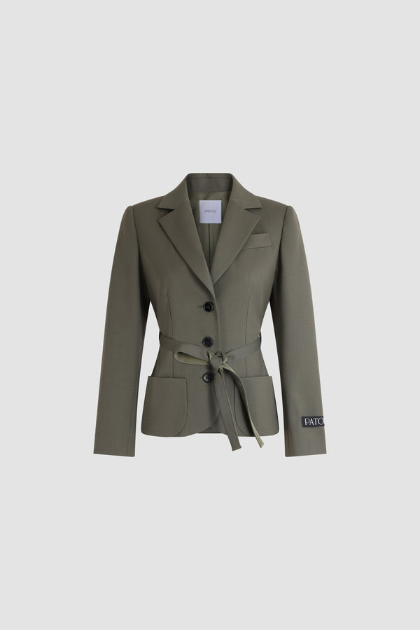 Patou - Belted jacket in responsible wool - Ivy Green - Green jacket in responsible wool. Long sleeves. Tailored collar. Button fastening. Belted waist.