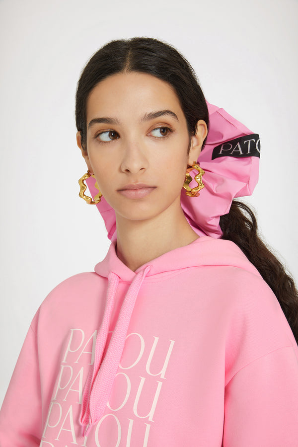 Patou - Felpa Patou Patou en coton bio - Pink - Patou mania.Felpa in cotone bio rosa. Vestibilità larga. Collo con cappuccio. Patou multicolore stampati sul davanti. Polsini e orlo a costine.