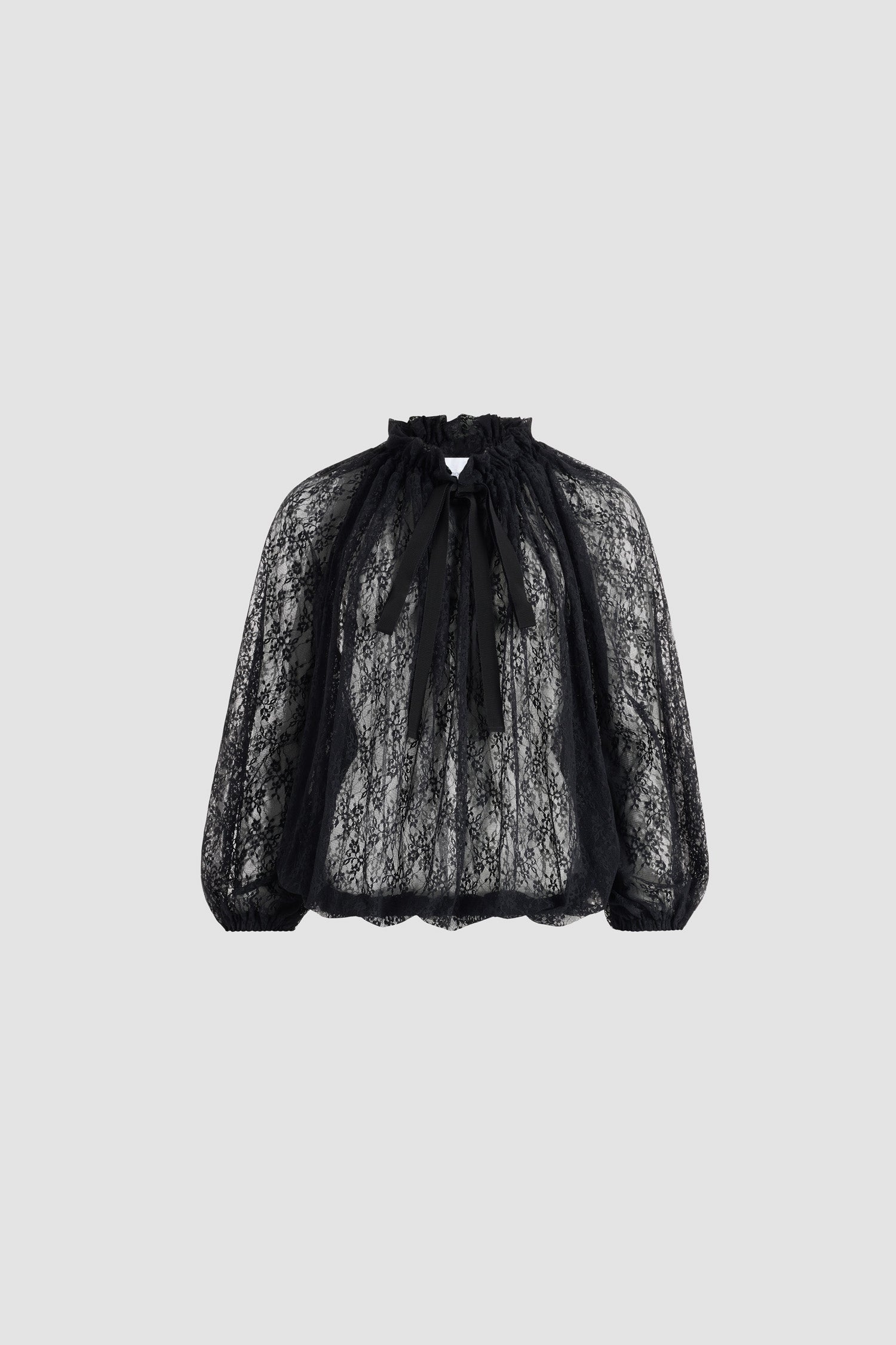 Patou - Iconic drawstring top in lace jersey - Black - Black lace jersey top. Drawstring collar with flounce at the front and long grosgrain ties. Batwing sleeves with elasticated cuffs. Elasticated waist.