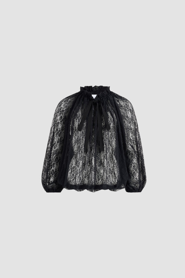 Patou - Top iconico con coulisse in jersey di pizzo - Black - Top in jersey di pizzo nero. Collo con coulisse con volant sul davanti e lacci lunghi in grosgrain. Maniche a pipistrello con polsini elasticizzati. Vita elasticizzata.