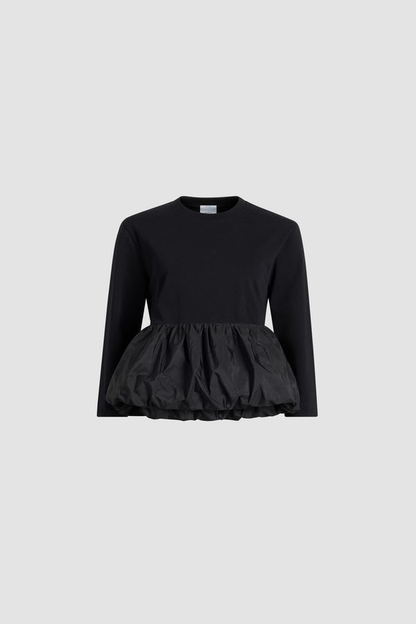 Patou - Ruffle hem t-shirt in organic cotton and faille - Black - Black organic cotton t-shirt. Thick jersey. Peplum silhouette with a polyester faille ruffle. Crewneck. Embroidered Patou logo at the front.