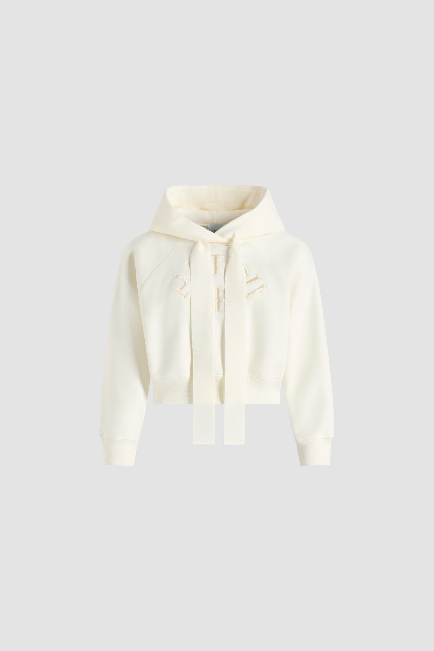 Patou - Felpa con cappuccio con logo Patou e monogramma JP in cotone bio - Snowberry White - Felpa in cotone bio Snowberry White. Modello corto. Collo con cappuccio con coulisse in grosgrain. Logo Patou e monogramma JP ricamati sul davanti. Maniche raglan. Polsini e fondo a costine.