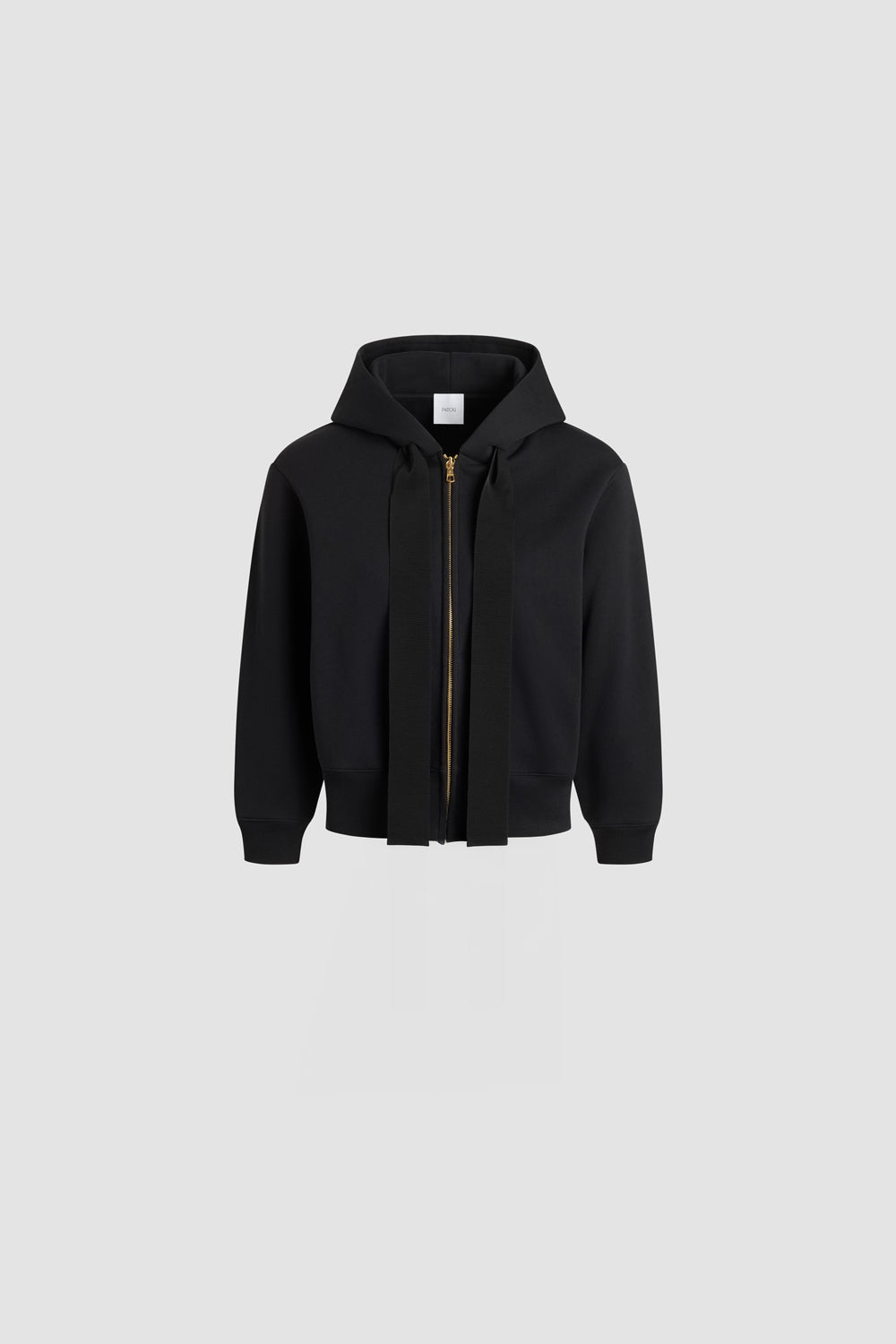 Patou - Patou logo and JP monogram zip-up hoodie in organic cotton fleece - Black - Black organic cotton fleece hoodie. Hooded collar with grosgrain drawstring. Gold-tone zip at the front. Embroidered Patou logo and JP monogram at the back. Side pockets. Ribbed cuffs and hem.