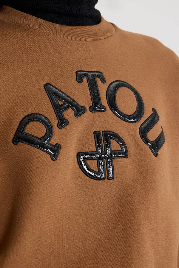 Patou - Vinyl Patou logo and JP monogram sweatshirt in organic cotton fleece - Mahogany - Mahogany organic cotton fleece sweatshirt. Crewneck. Ribbed collar, cuffs and hem. Contrast vinyl Patou logo and JP monogram at the front.