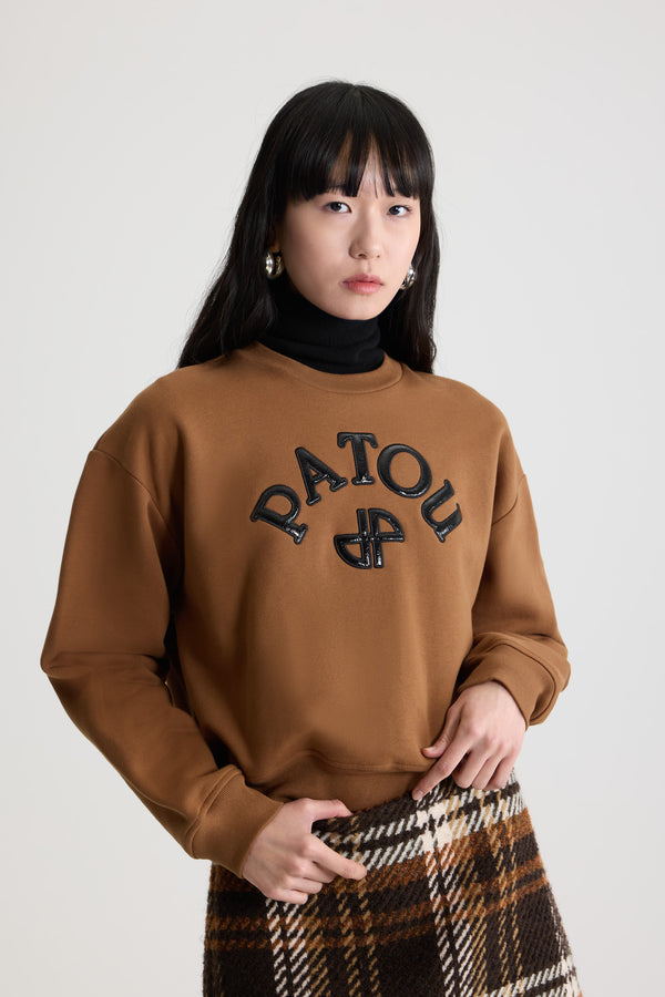 Patou - Vinyl Patou logo and JP monogram sweatshirt in organic cotton fleece - Mahogany - Mahogany organic cotton fleece sweatshirt. Crewneck. Ribbed collar, cuffs and hem. Contrast vinyl Patou logo and JP monogram at the front.